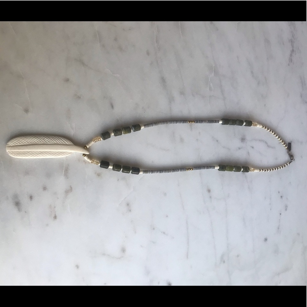 Long Anthropologie feather necklace
